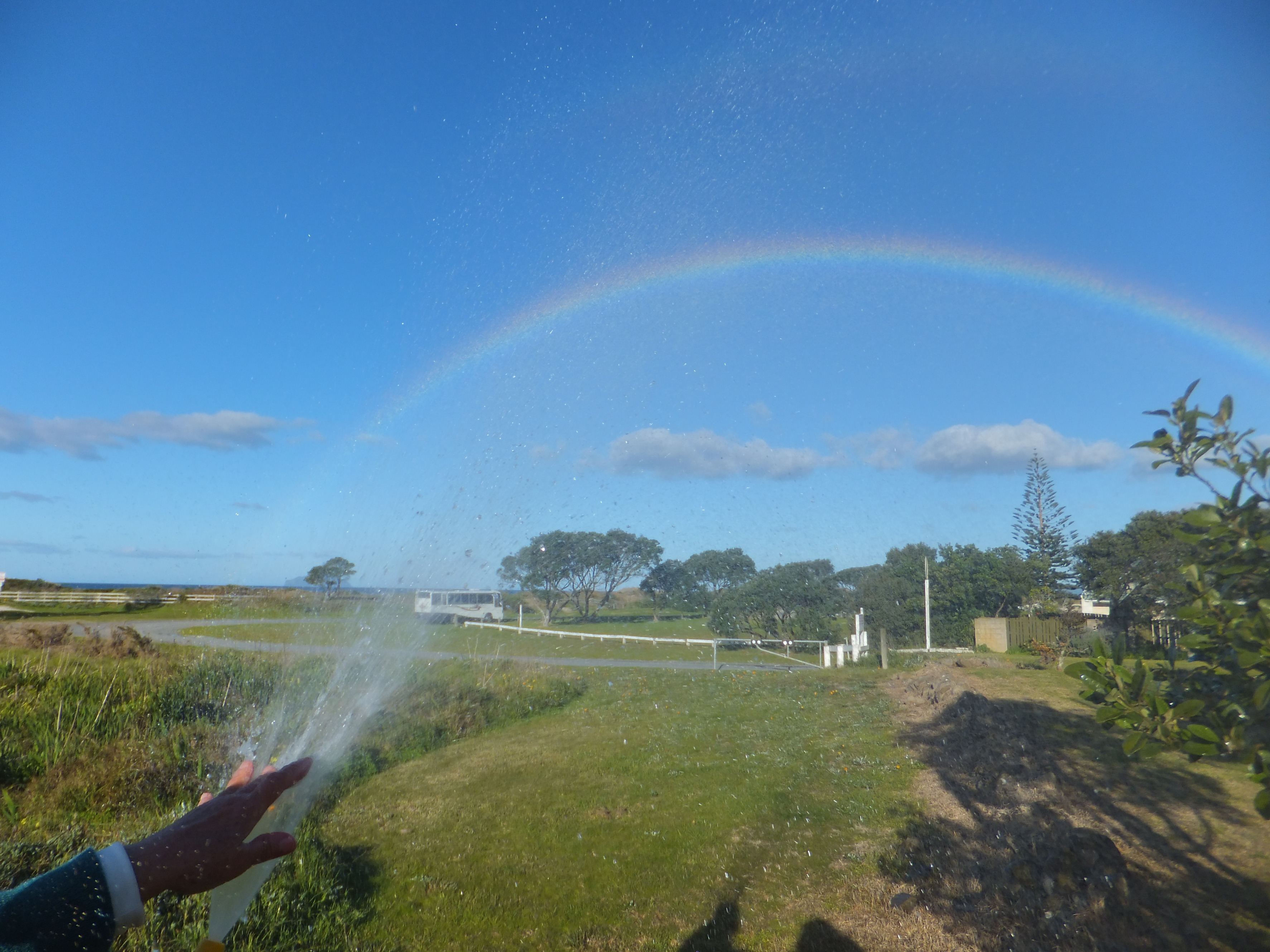 Aroha's rainbow showing in water mist 4/35