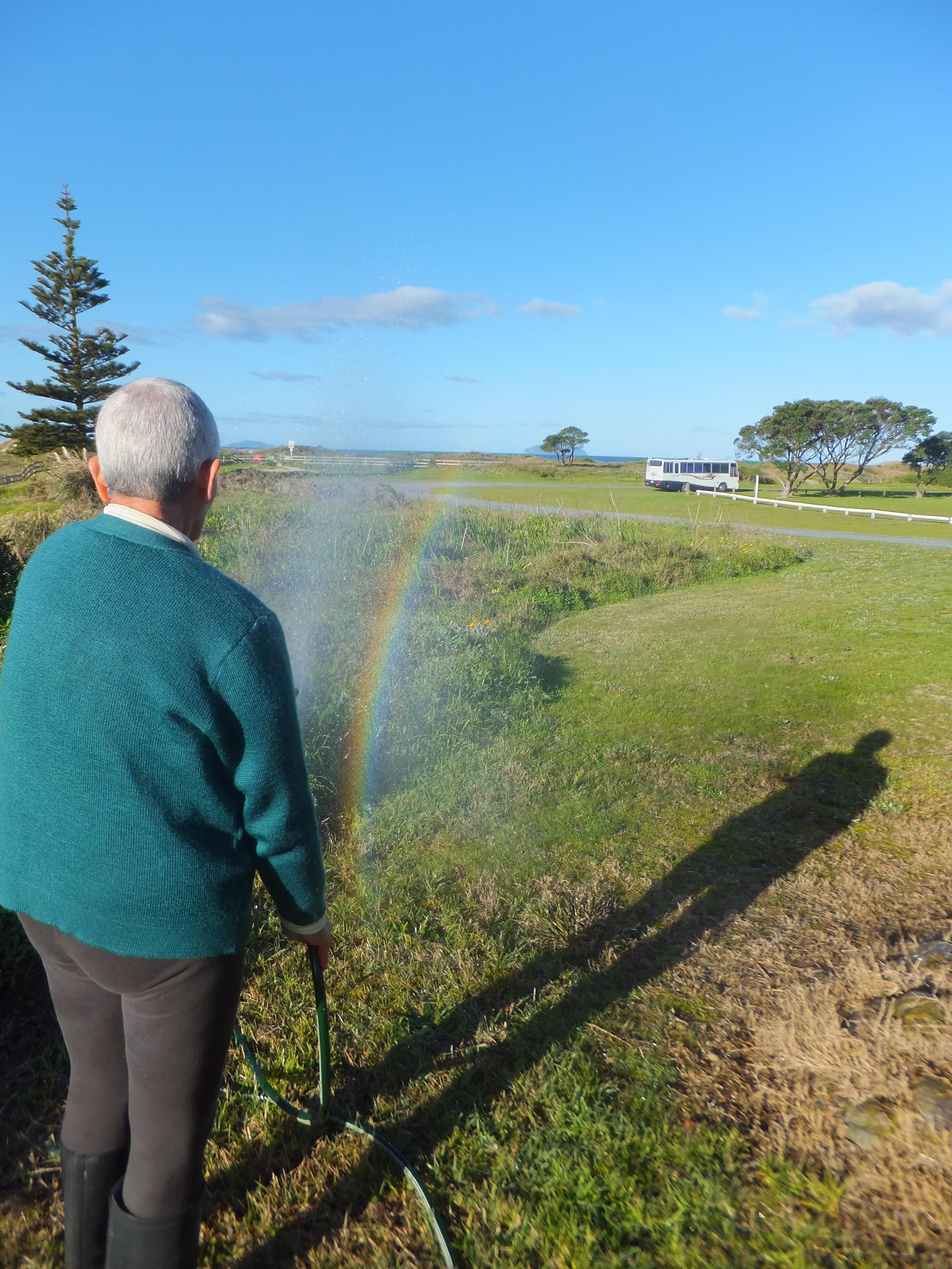 Aroha's rainbow showing in water mist 1/30