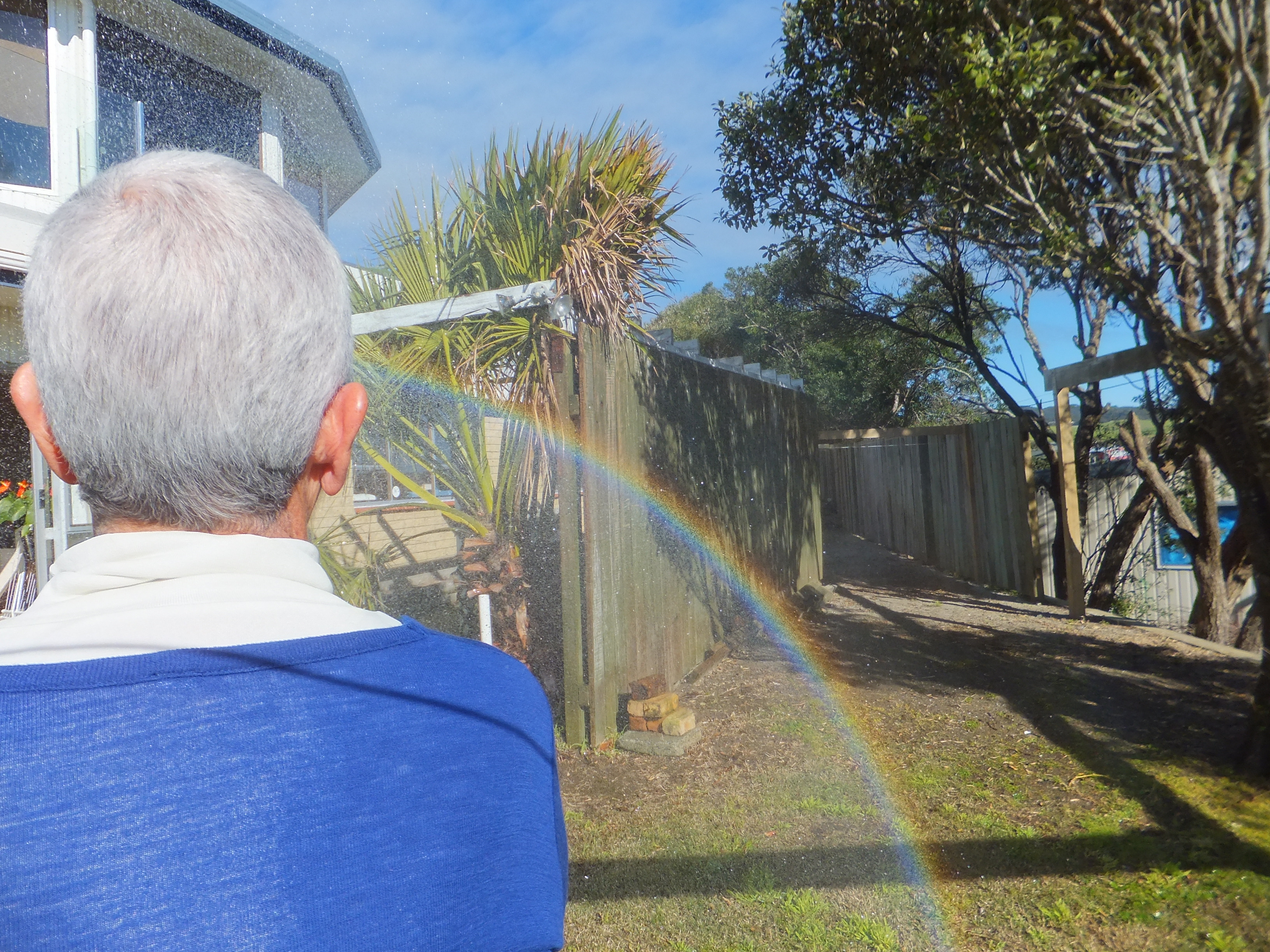 Aroha's rainbow showing in water mist 5/55